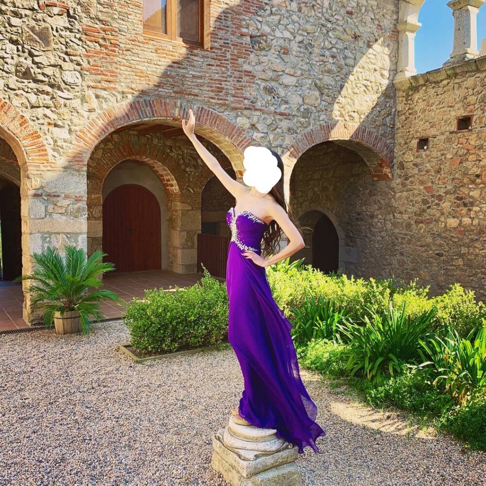 Purple flowy chiffon gown by Mac Duggal